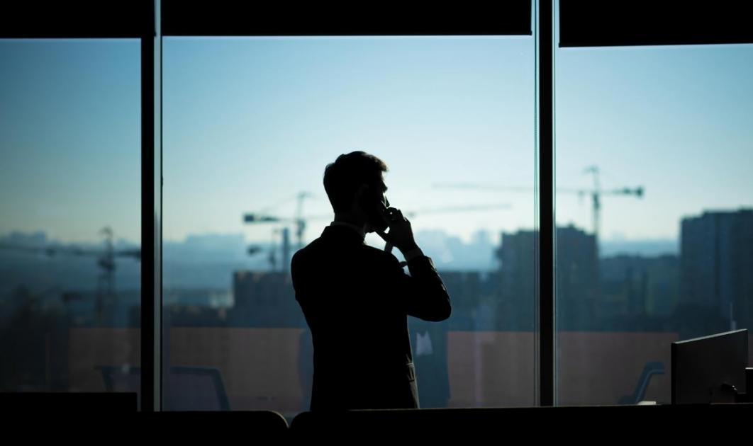 Financial trading education workspace with charts and planning materials